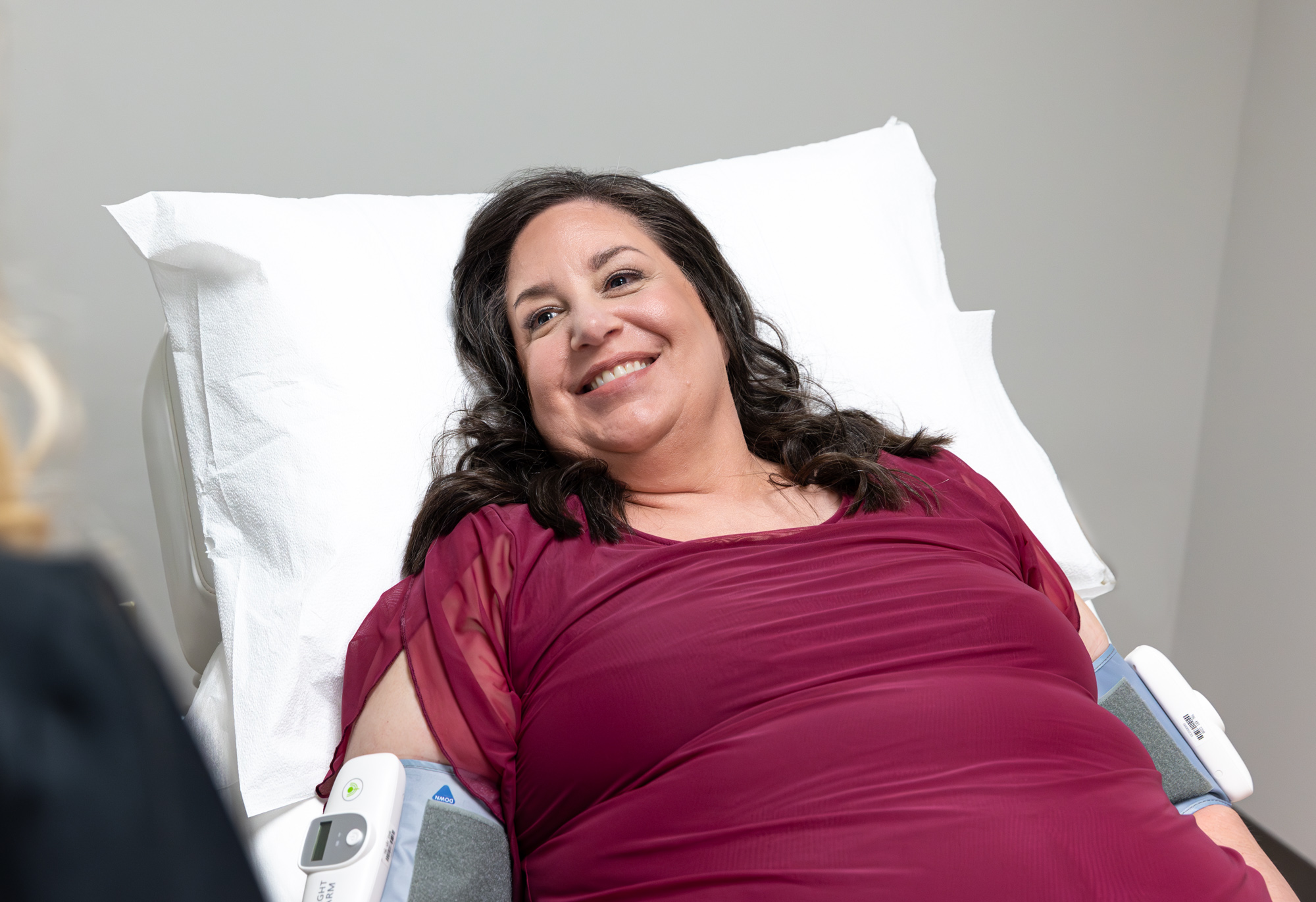 A patient resting comfortably during ANS cardiac testing at E. Michael Health