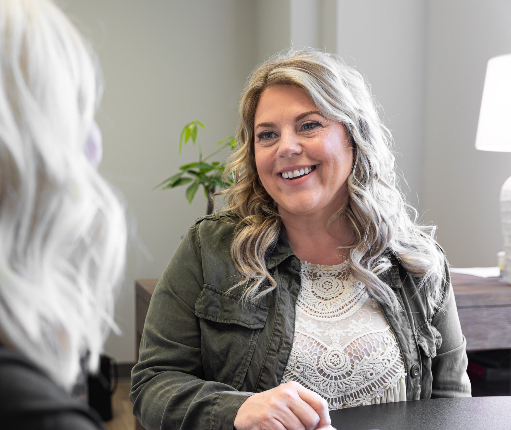 A relaxed coaching conversation at E. Michael Health